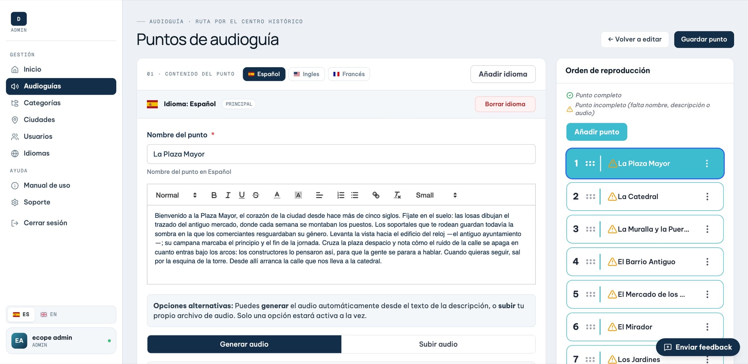 Panel de Audiloo: editor de un punto de audioguía con texto multi-idioma (ES/EN/FR), generación de audio por IA y orden de reproducción de las paradas.